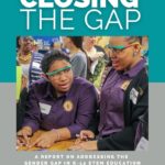 Cover page of report featuring two teenage girls working with tools